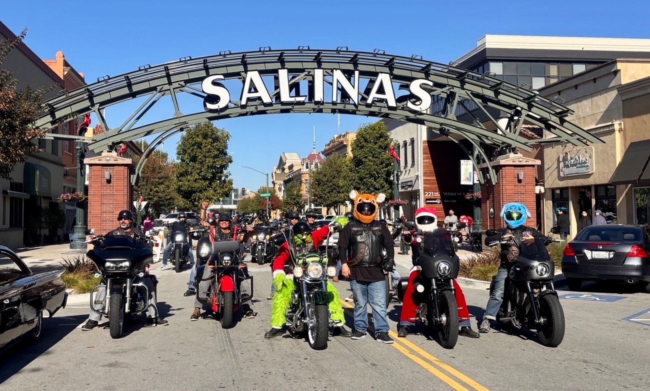 Riders under the Salinas sign